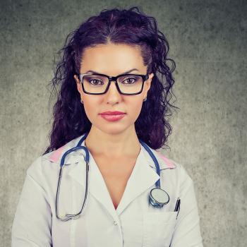 female medic wearing glasses