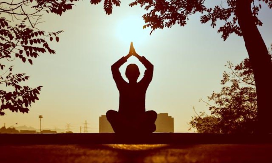 yoga in field